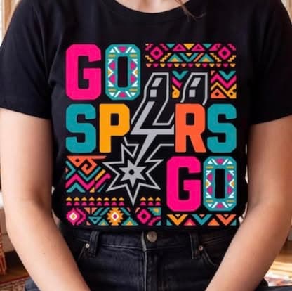 A woman wearing a black Go Spurs Go tee custom printed by High Quality Customs.